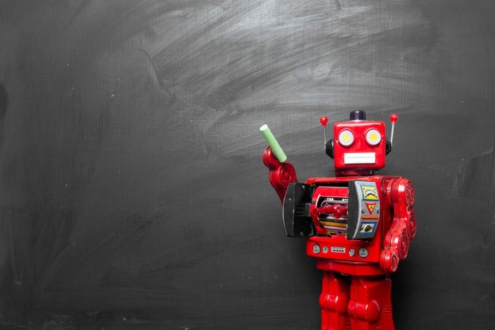 Red robot blackboard teacher.jpg
