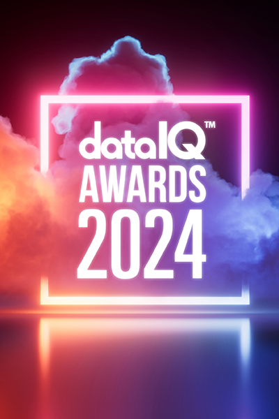 DataIQ Awards 2023 logo and artwork. The background is a dramatic shot of the DataIQ Awards logo with neon lights and smoke rising